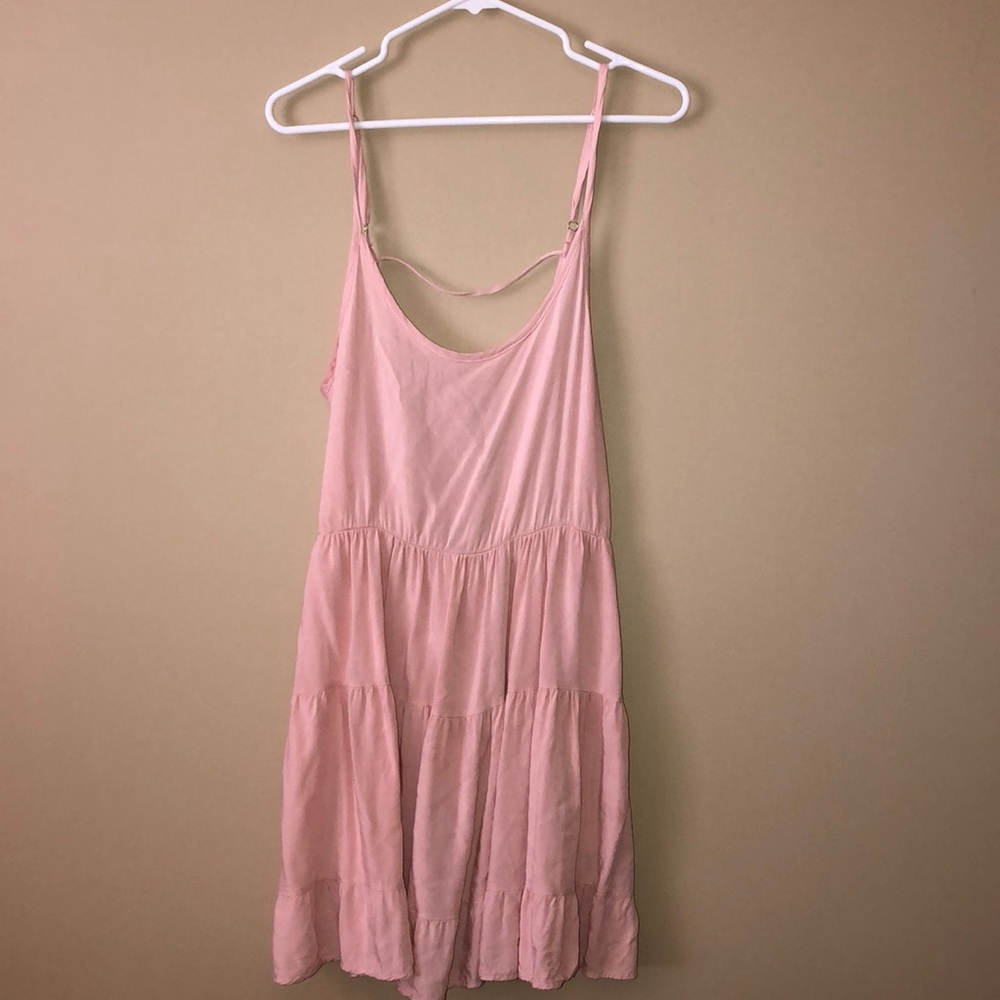 Full tilt from Tilly’s light blush dress